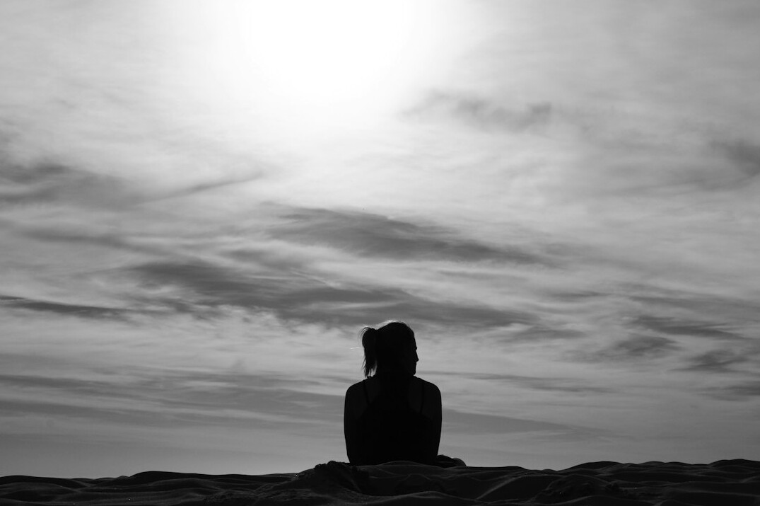 person reflecting alone