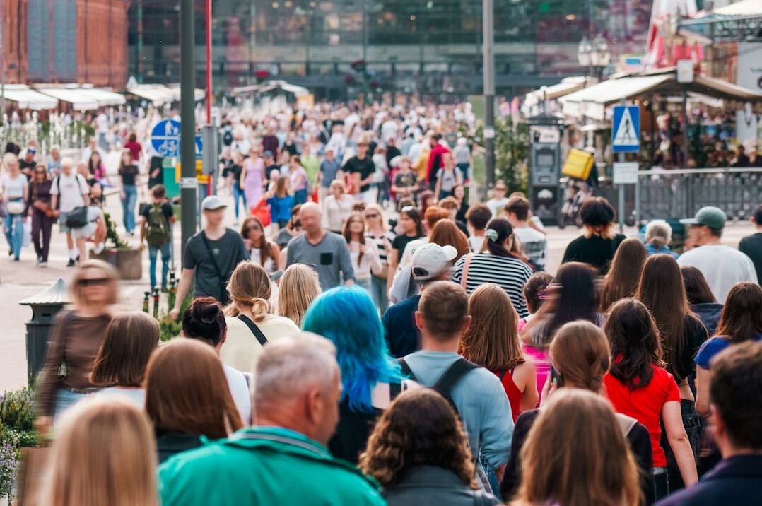 diverse crowd walking