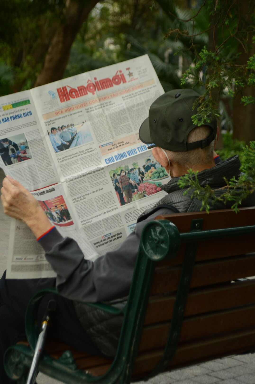 people reading newspaper